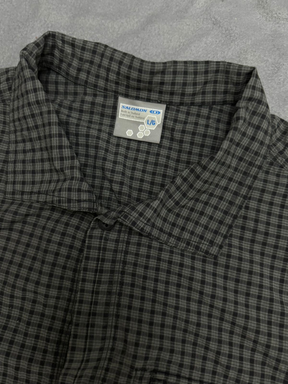 a- SALOMON BUTTONED UP SHIRT