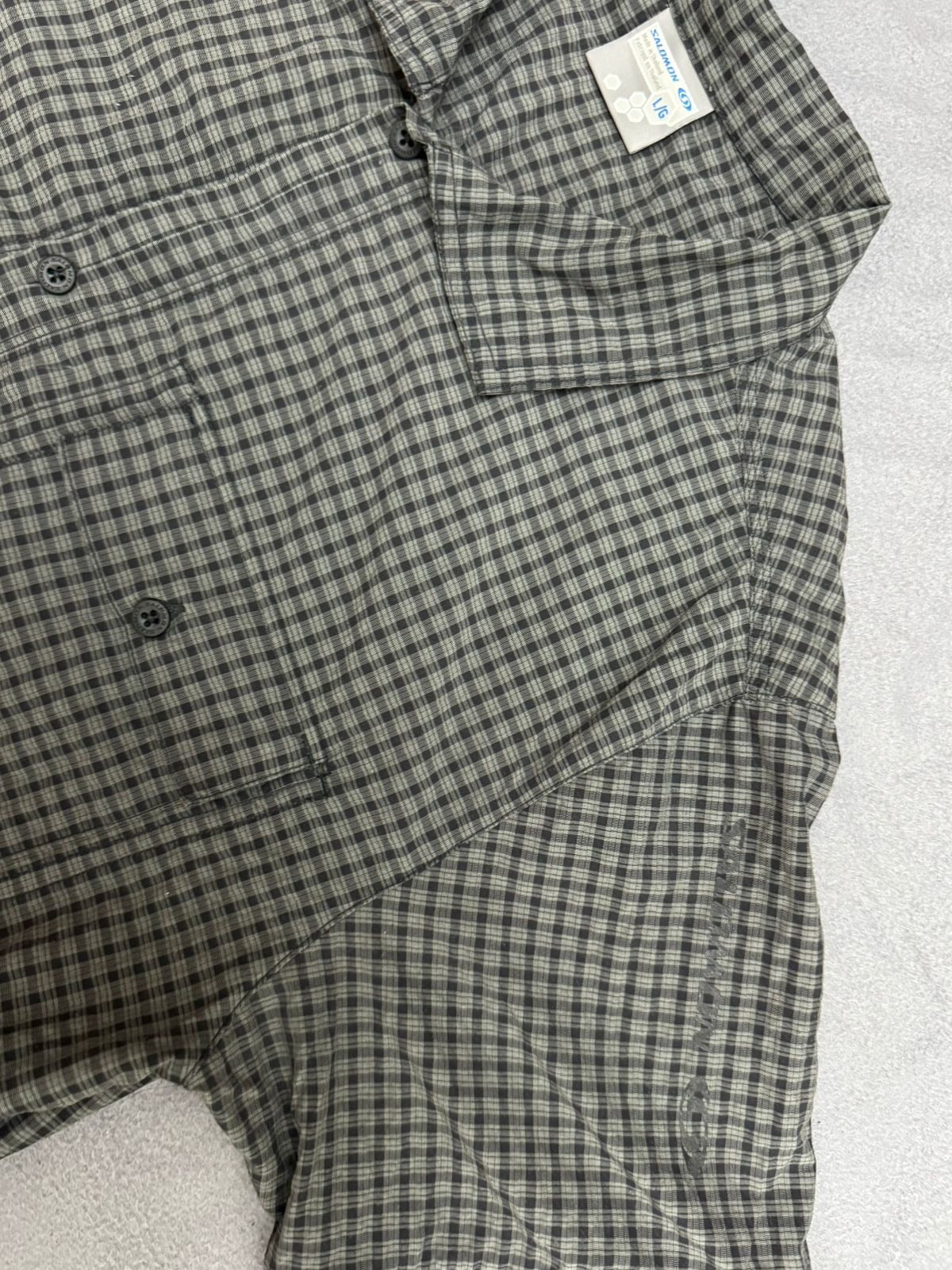 a- SALOMON BUTTONED UP SHIRT